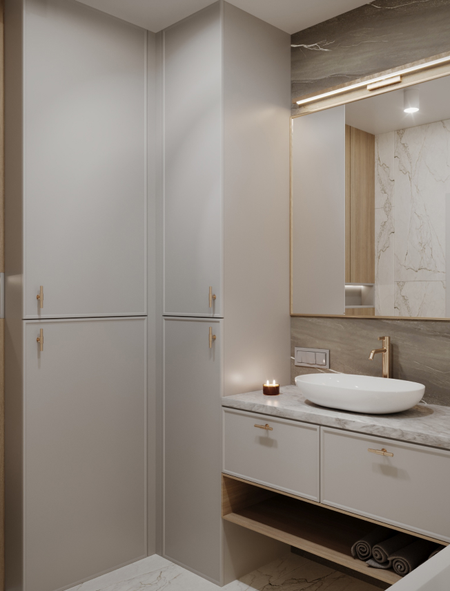 Biała umywalka z złotymi dodatkami w jasnej łazience