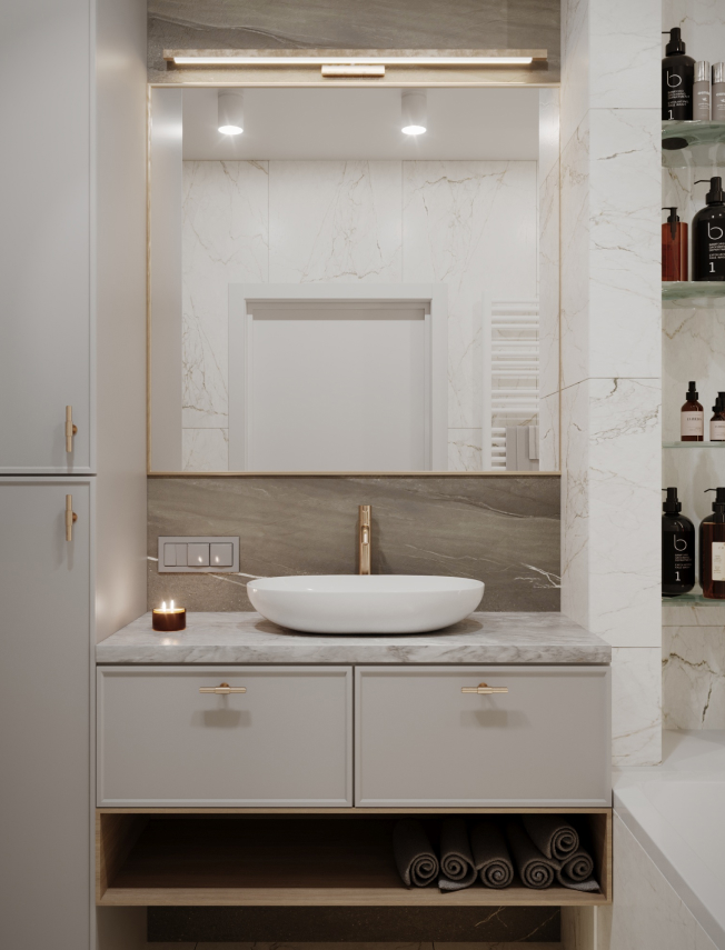 Lustro i biała umywalka z złotymi dodatkami