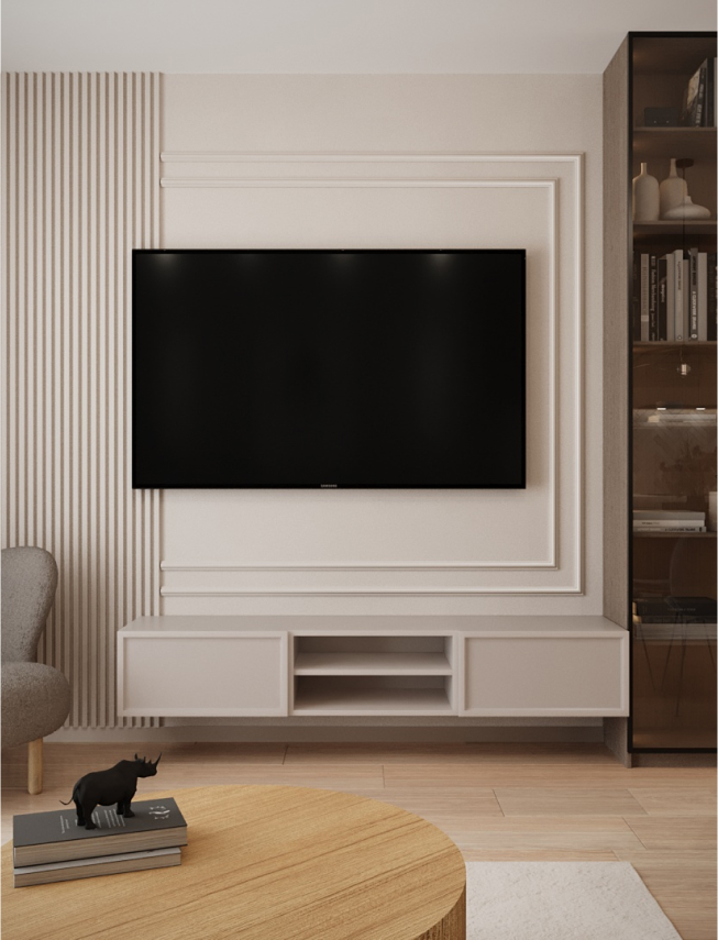 Telewizor na ścianie w jasnym salonie